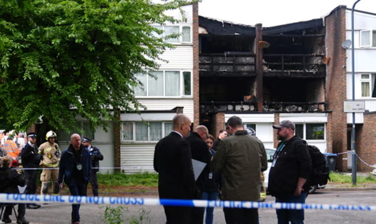 Man held on suspicion of murder after children and woman die in London fire