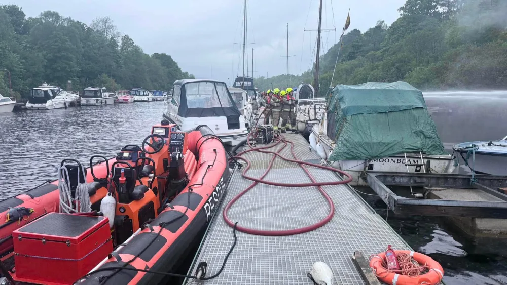 A boat caught fire on the River Leven near Balloch on Thursday evening. (Credit: Loch Lomond Rescue Boat/PA)
