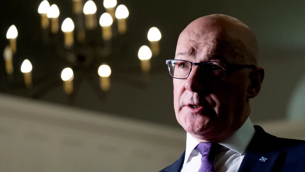Headshot of John Swinney speaking