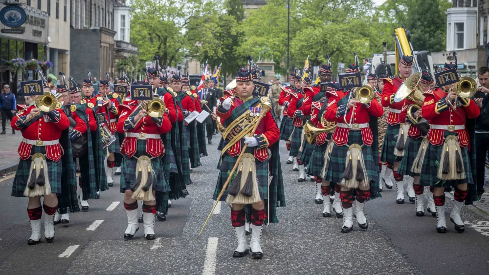 A military band playing on a street