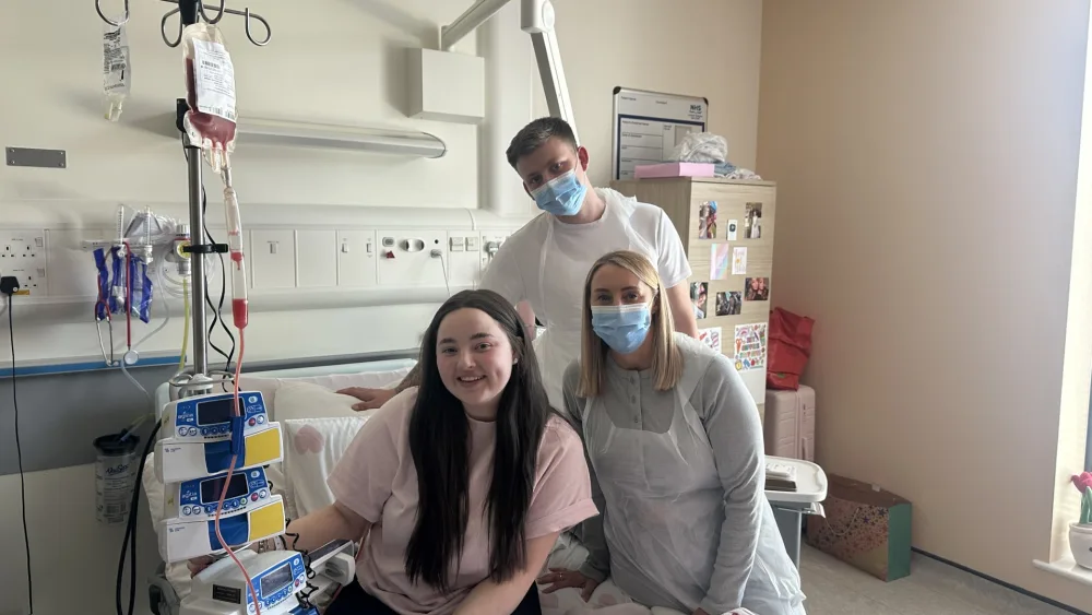 Ayley Crawford with Riley and her mother in hospital