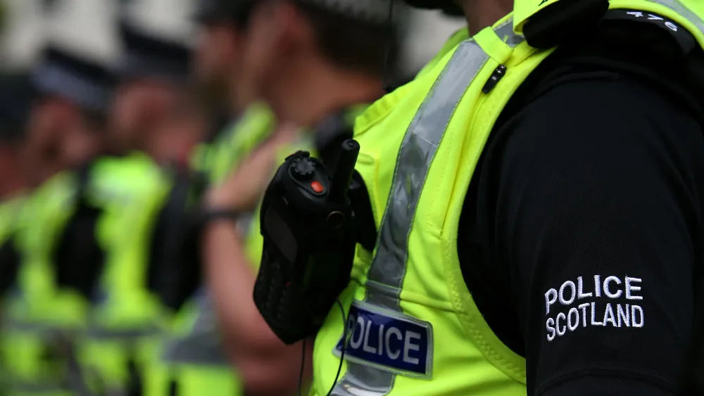 Police Scotland officers seen from neck down