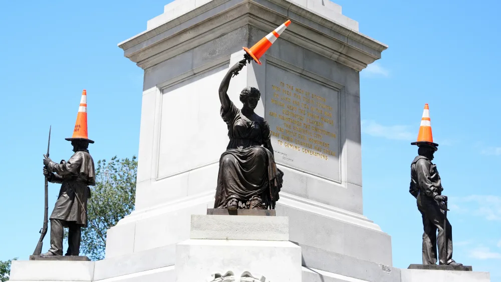 The Soldiers and Sailor Monument on Boston Common wears traffic cones
