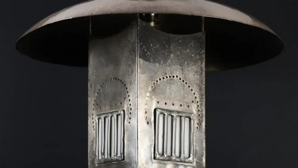 A silver Charles Rennie Mackintosh-design lantern