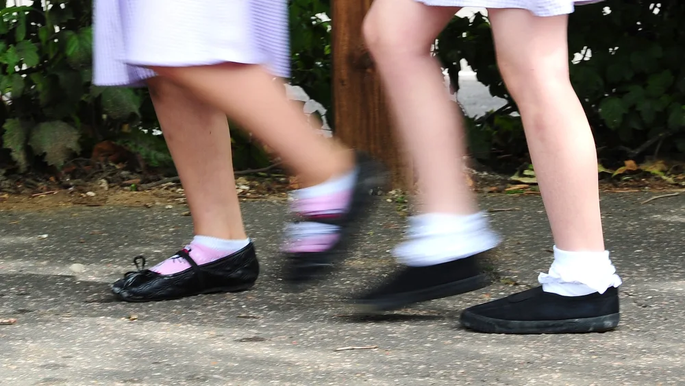 Children play a game in a park
