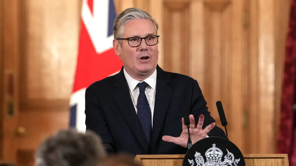 Keir Starmer gesturing with his hand as he speaks