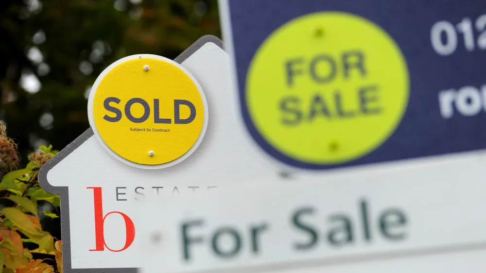 For sale and sold signs outside