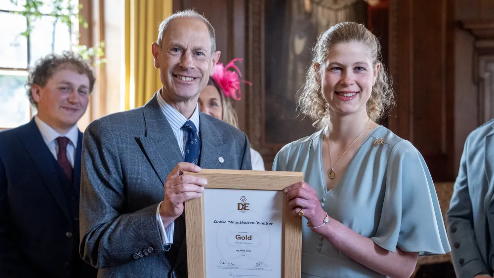 Prince Edward giving his daughter her DofE award