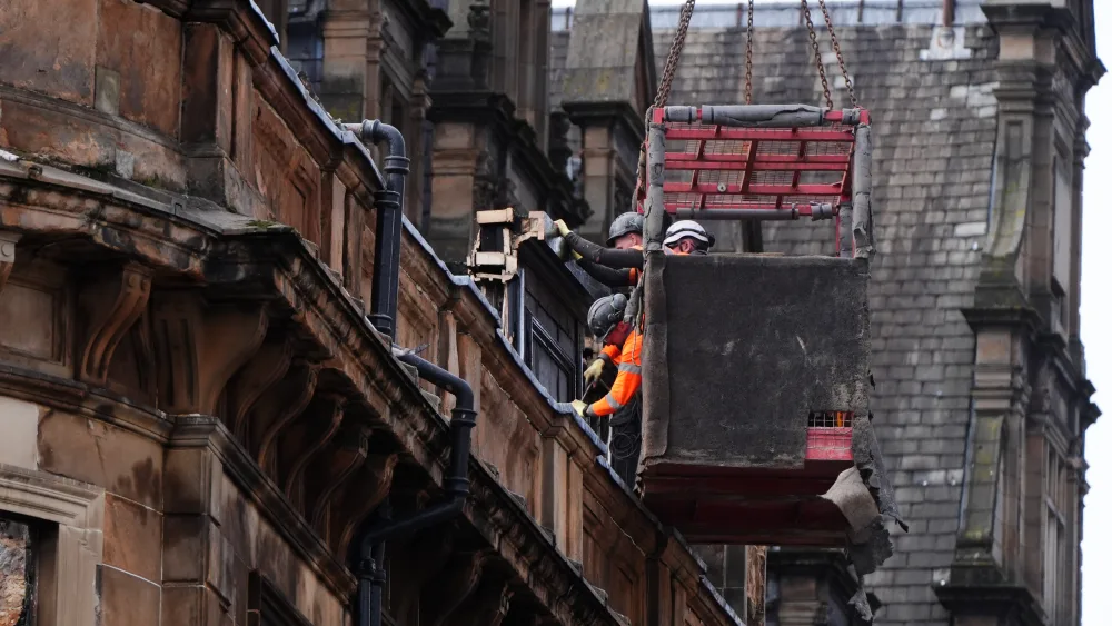 Workers demolishing building following fire near Glasgow Central
