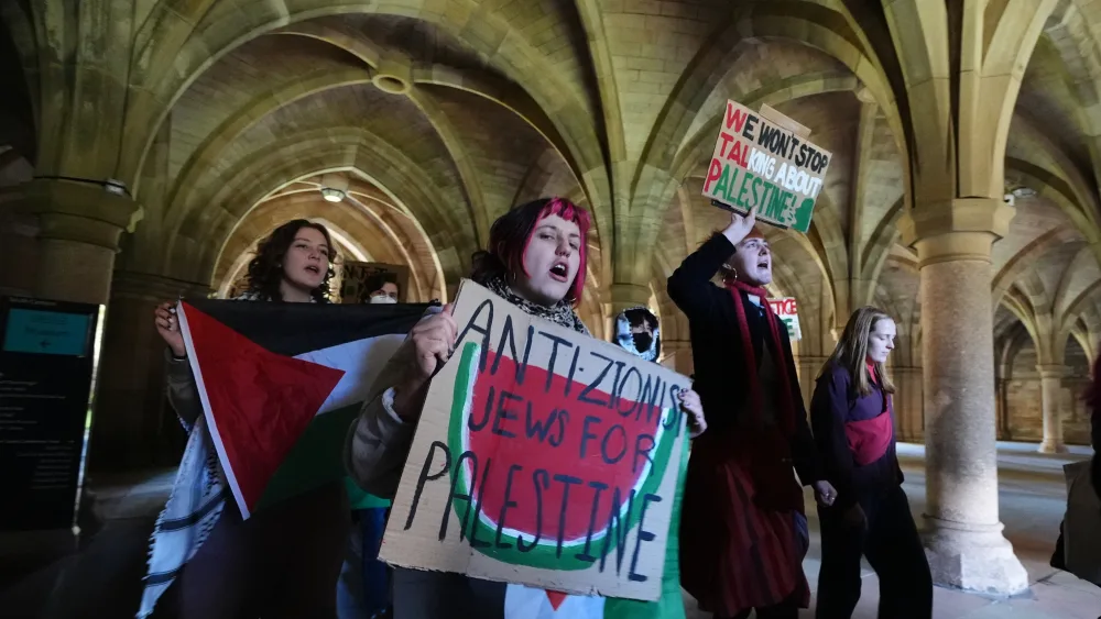 People take part in a pro-Palestine protest at the University of Glasgow