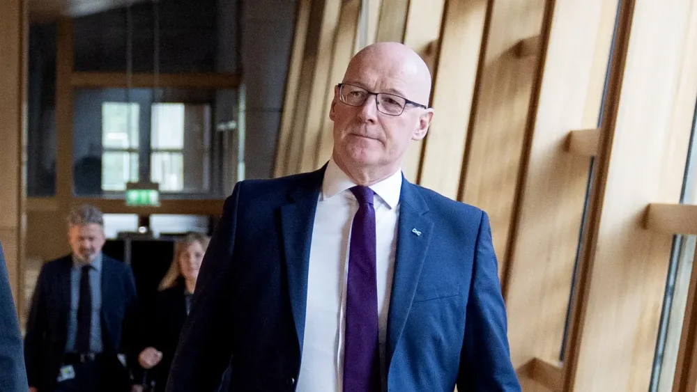 First Minister John Swinney in the Scottish Parliament