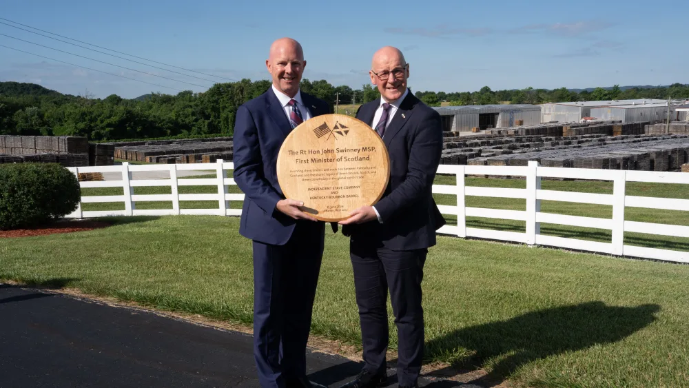First Minister John Swinney, right, with with Brad Boswell, chief executive of the Independent Stave Company during a tour of Coopers Lodge, Kentucky