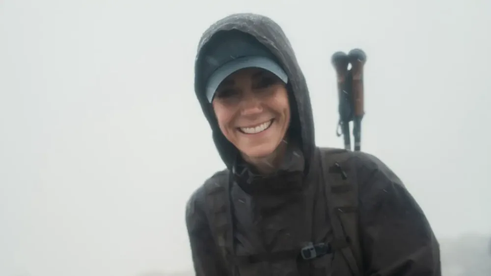 Kate at the summit of Ben Nevis during her mammoth trek