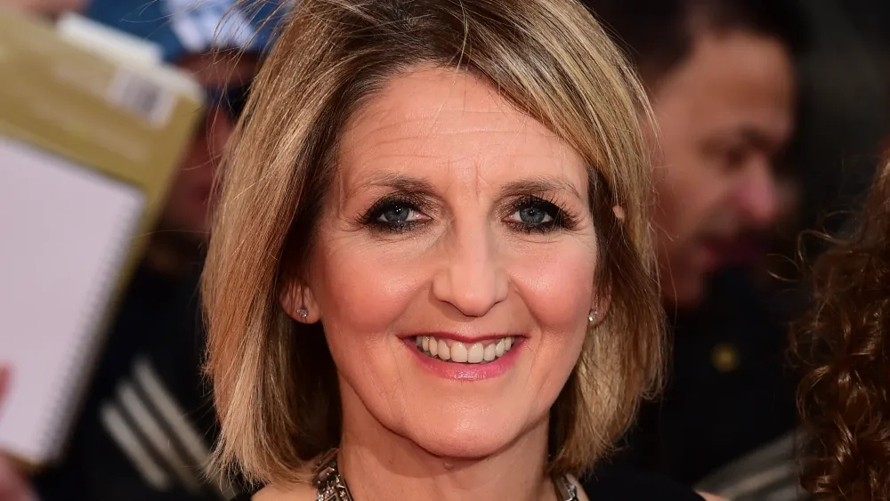 Headshot of Kaye Adams smiling