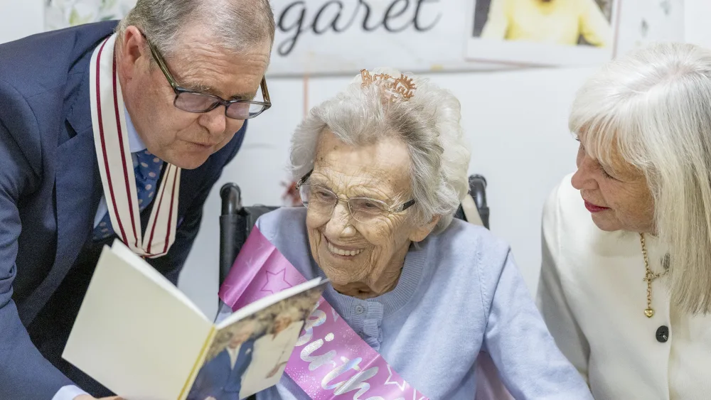 Margaret Blair celebrates her 105th Birthday in McKellar House. She is joined by Deputy Lord Lieutenant David Girdwood and her daughter, Senga Neave. (Erskine Veterans Charity/Jamie Williamson/PA)