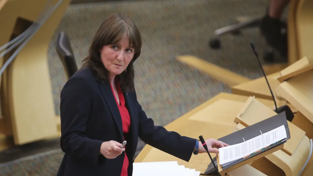 Maree Todd standing while speaking in Holyrood