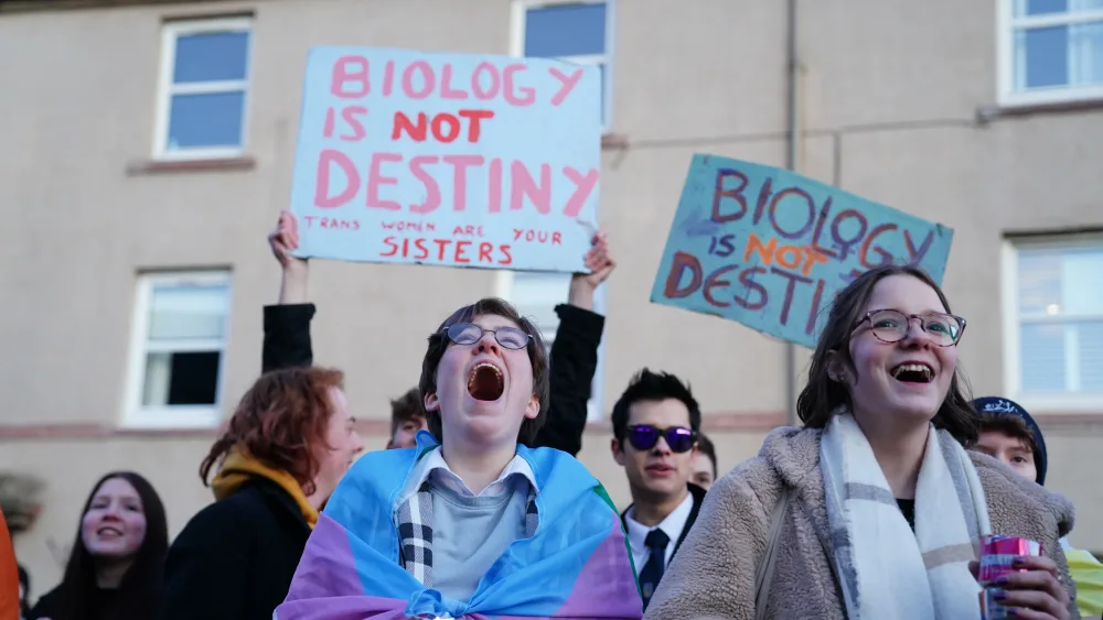 Gender rights campaigners hold a protest