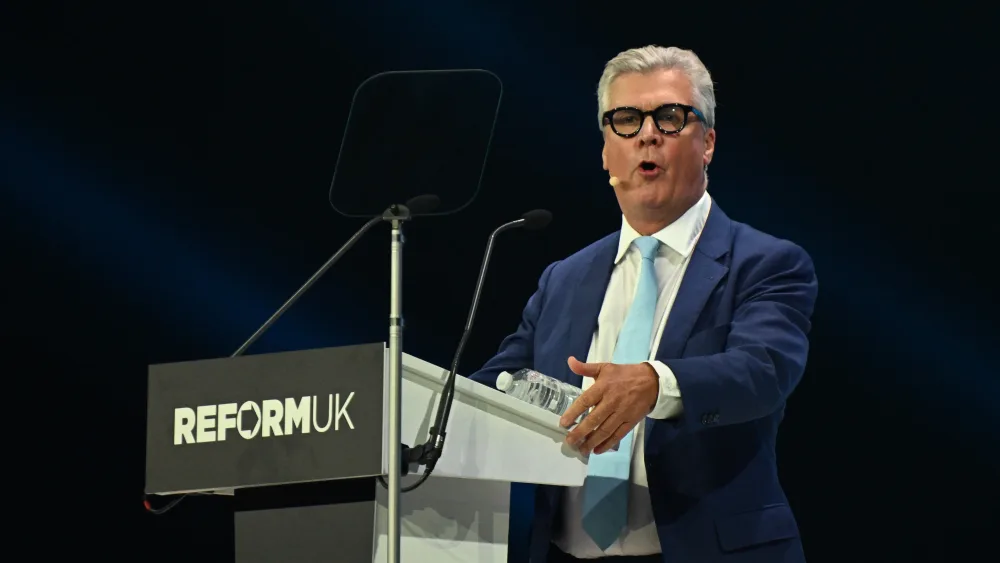 Malcolm Offord speaking from a Reform UK lectern
