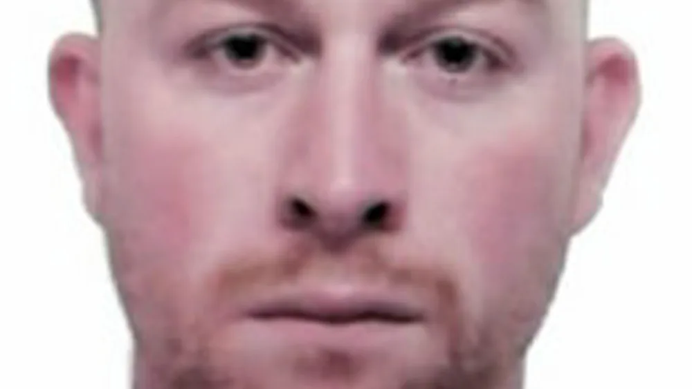 Kevin Thomas Parle, 45, is wanted by Merseyside Police in connection with two murder investigations