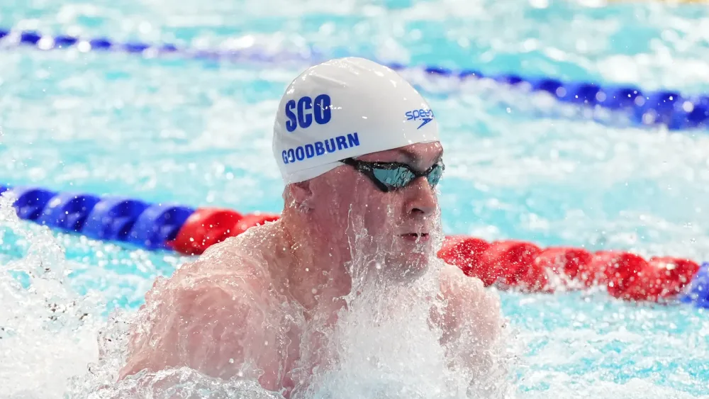 Archie Goodburn swimming during the men’s 50m breaststroke final at the 2026 Commonwealth Games in Glasgow