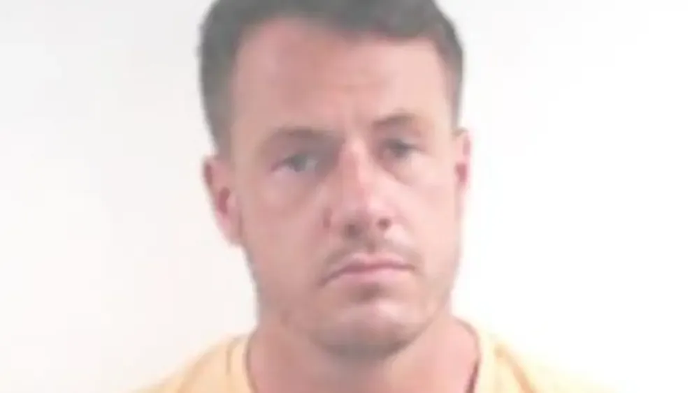 Handout mugshot of Cameron Ross