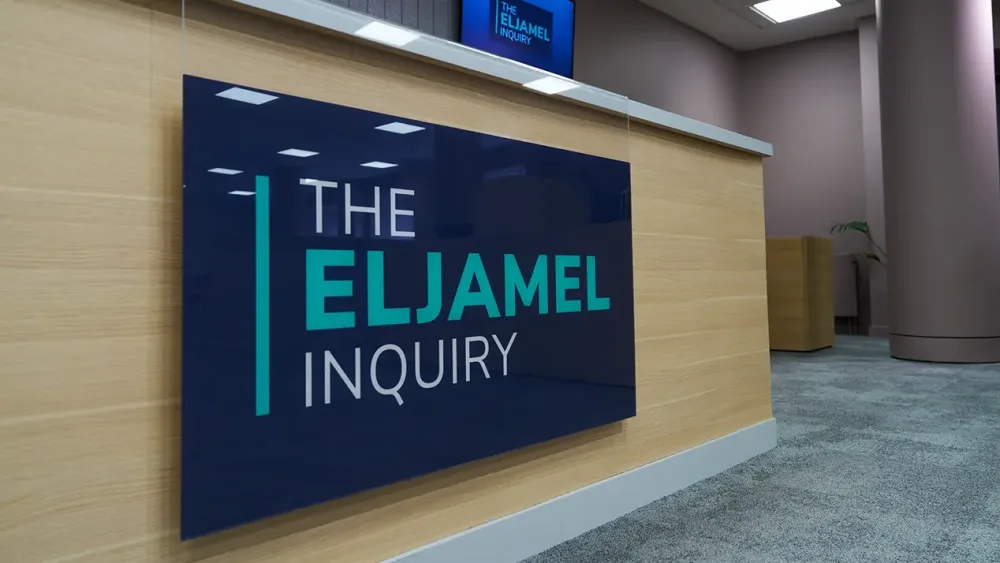 A view of a sign reading 'The Eljamel Inquiry'