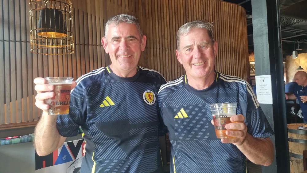 Brothers Peter (left) and Sean Reilly, who are in Boston for the World Cup