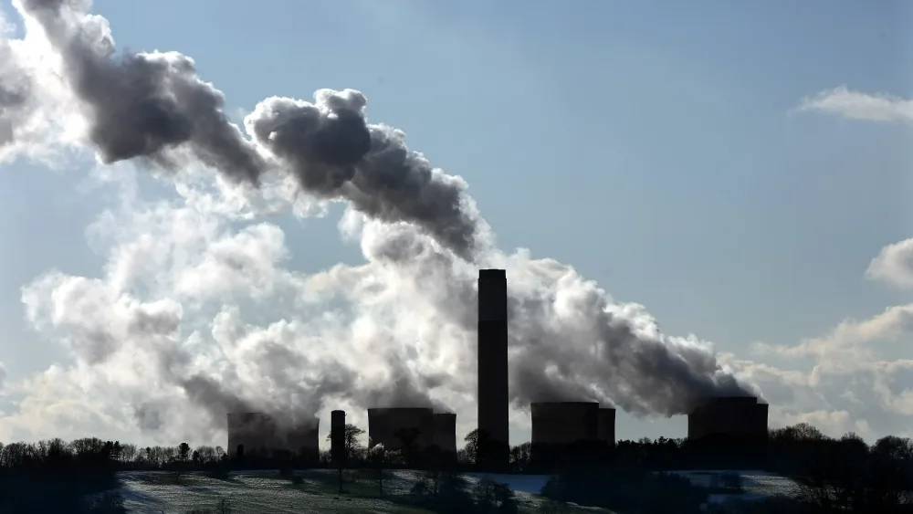 A power station spewing water vapour into the air