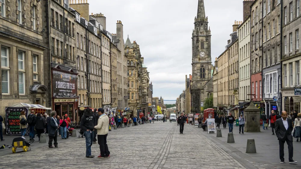 People enjoying a walk down the Royal Mile in Edinburgh