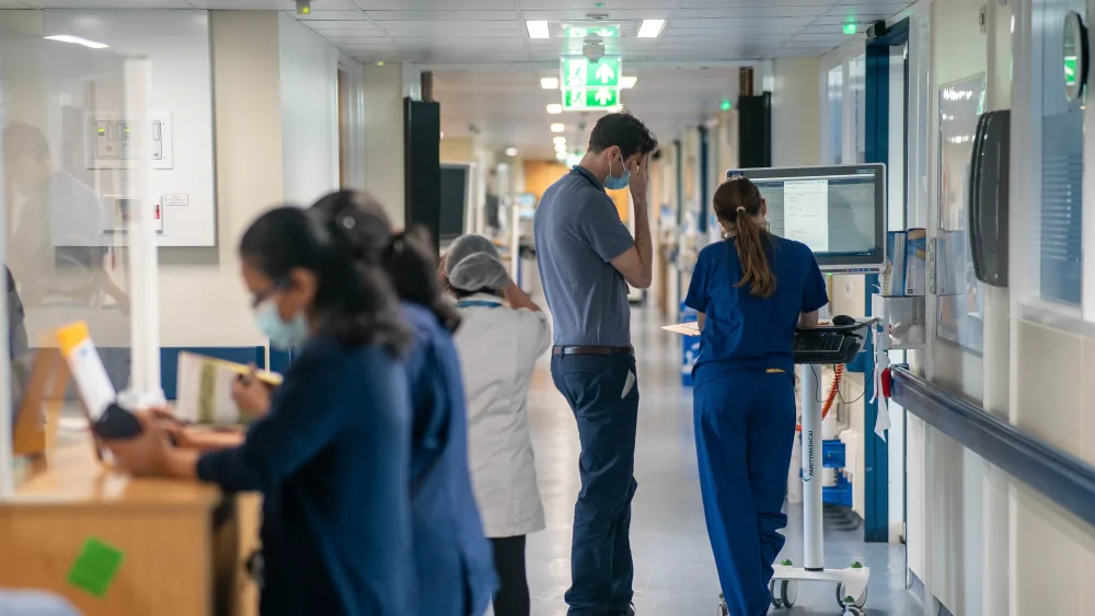 A doctor and nurse on a hospital ward