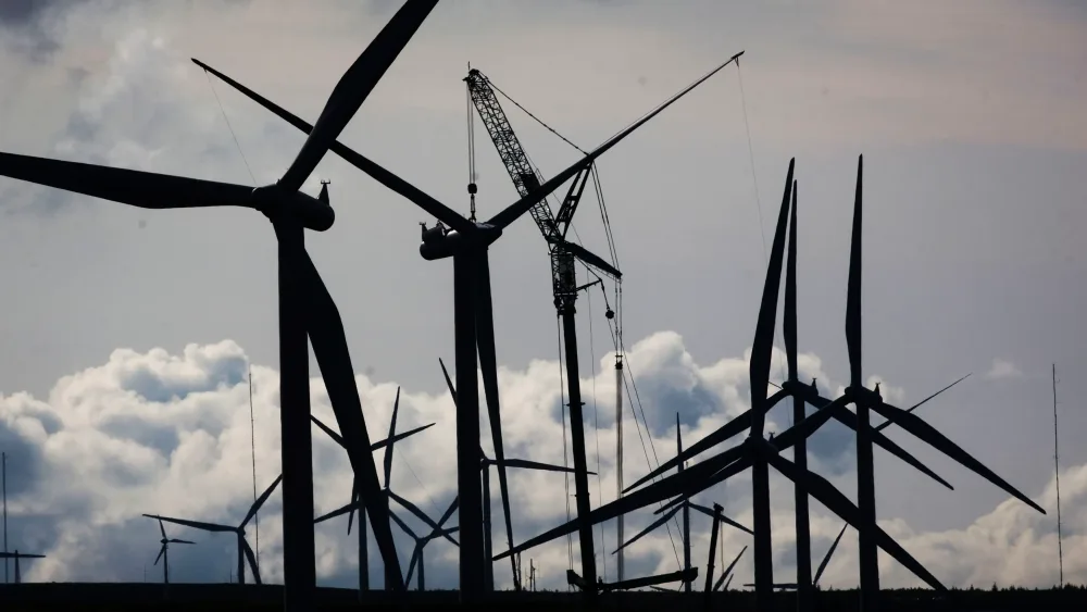 View of a wind farm and cloudy skies