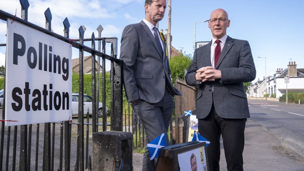 SNP Westminster leader Dave Doogan (left) seen here with John Swinney, accused the Scottish Secretary of ‘banal point scoring’ on the issue of whisky tariffs. (Jane Barlow/PA)