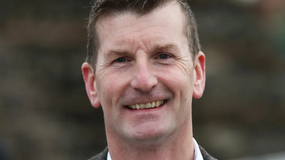 Headshot of Dave Doogan smiling