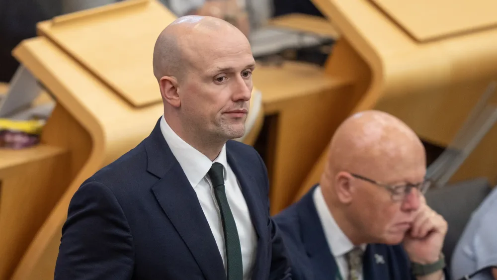Stephen Flynn standing in Holyrood