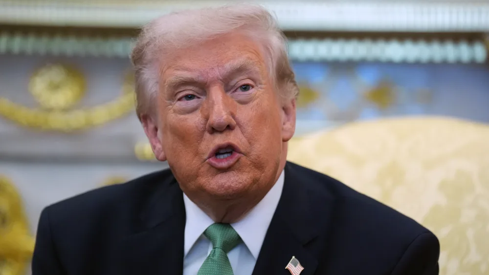 Head and shoulders photo of Donald Trump speaking