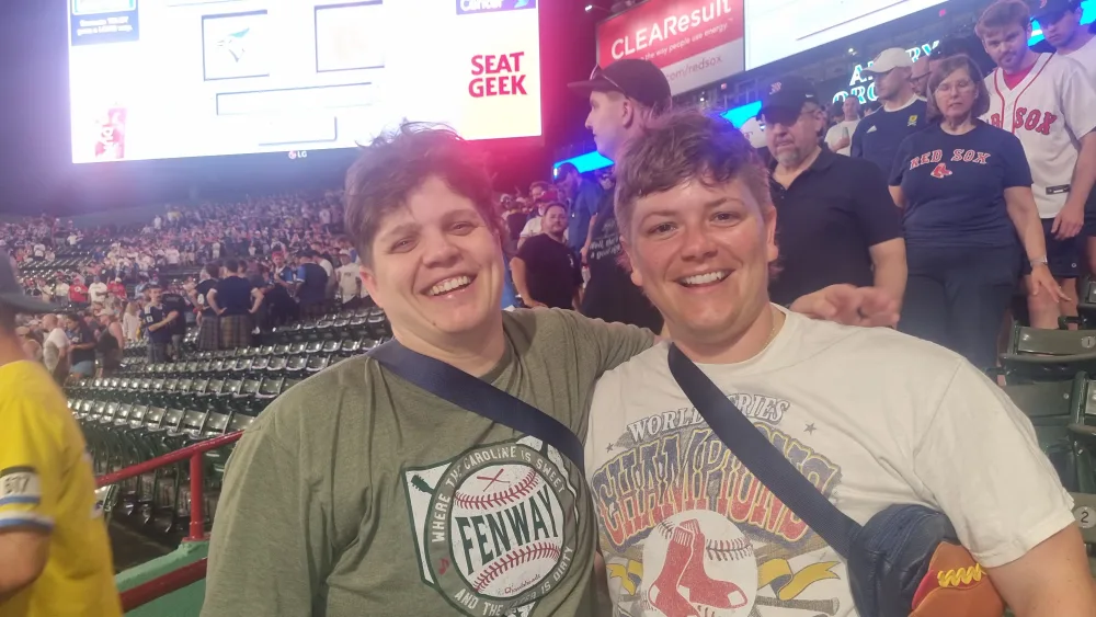Caroline Racio and Amber Dubois at a baseball game