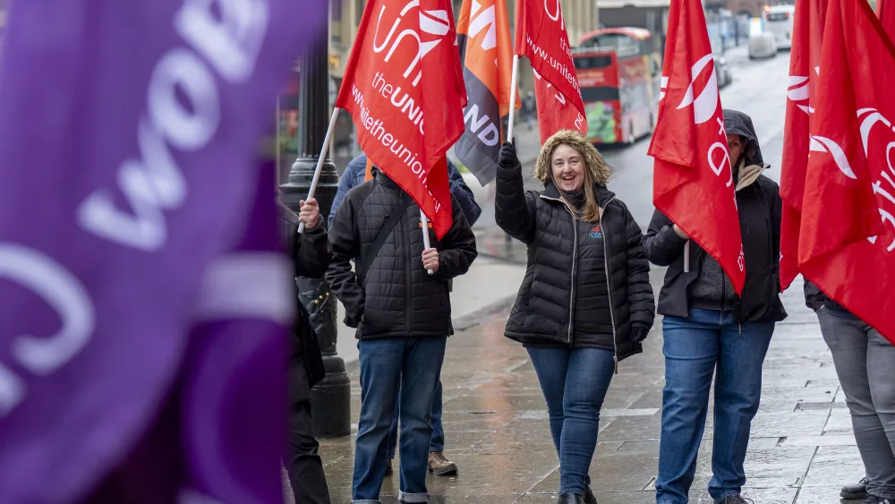 Union members holding flags