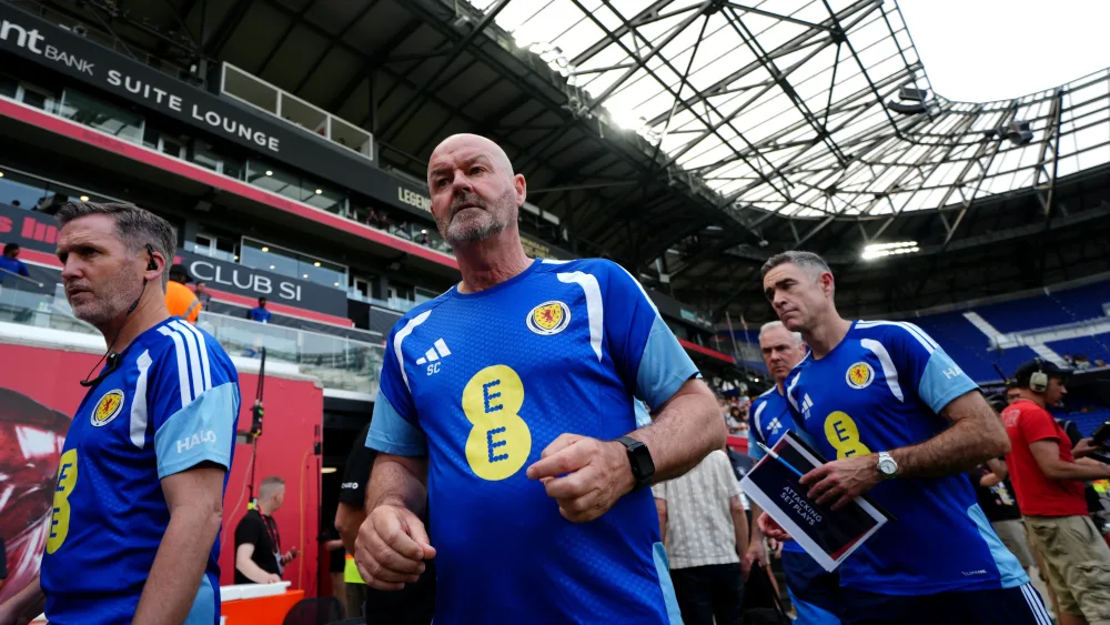 Steve Clarke and Scotland staff in a stadium
