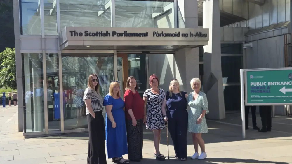 Women outside the Scottish parliament building in Edinburgh